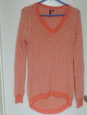 Poof! Peach Open‑Knit V‑Neck Sweater